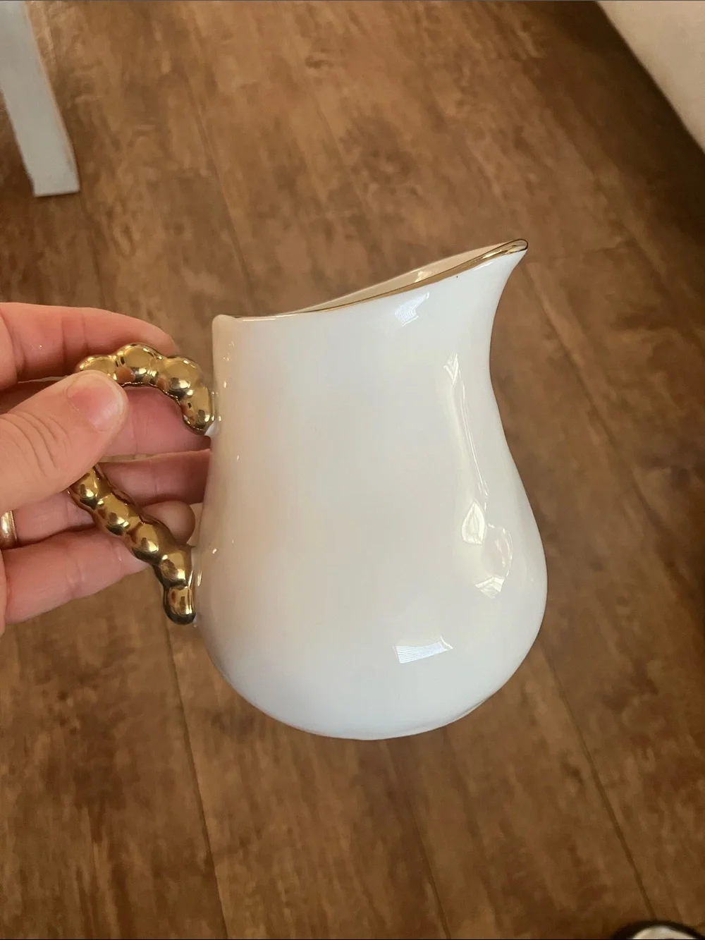 White Ceramic Creamer Pitcher with Gold Accent Handle